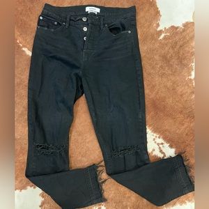 Black pistola distressed jeans with frayed edge